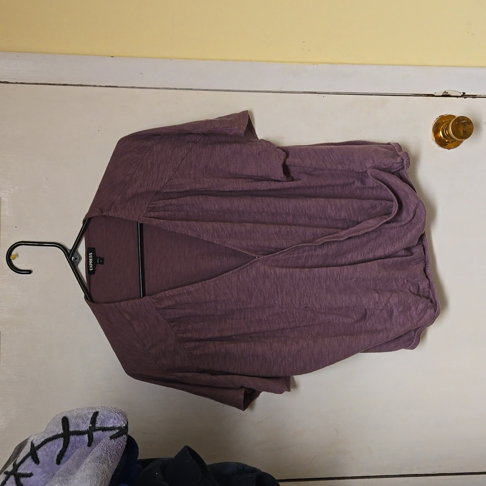 Express shirt size large a purple maroon color that has a hook